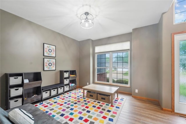 2385 Wolf Creek Trl, Hiawatha, IA 52233 - rec room featuring plenty of natural light and wood finished floors