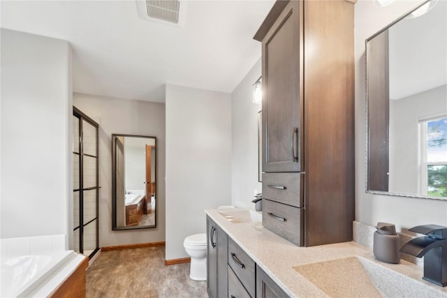 2385 Wolf Creek Trl, Hiawatha, IA 52233 - full bath with a garden tub, double vanity, and a shower with door