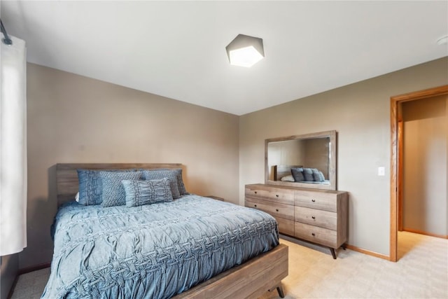 2385 Wolf Creek Trl, Hiawatha, IA 52233 - bedroom featuring light carpet and baseboards