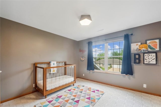 2385 Wolf Creek Trl, Hiawatha, IA 52233 - carpeted bedroom featuring baseboards