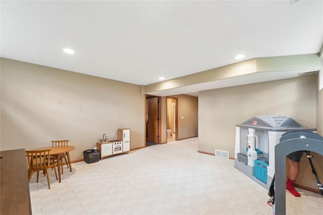 2385 Wolf Creek Trl, Hiawatha, IA 52233 - recreation room with recessed lighting and carpet flooring