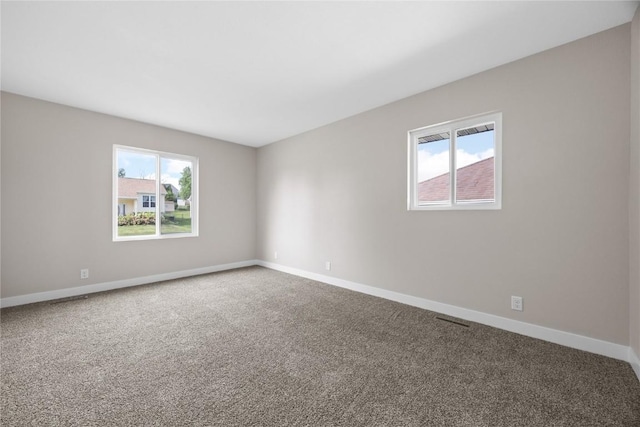 6612 Boulder Dr, Cedar Rapids, IA 52405 - carpeted empty room featuring baseboards