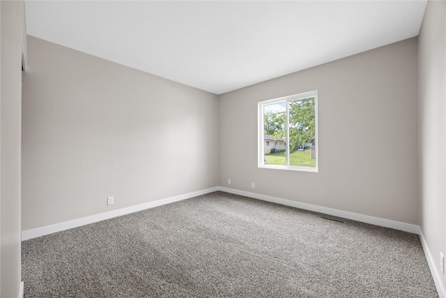 6612 Boulder Dr, Cedar Rapids, IA 52405 - carpeted empty room featuring baseboards
