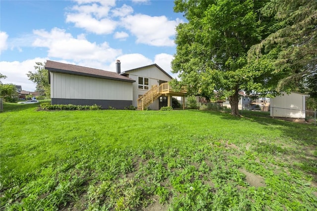 6612 Boulder Dr, Cedar Rapids, IA 52405 - view of yard featuring stairs and a deck