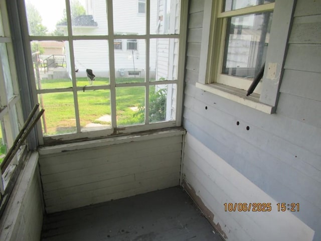 606 Meridian St, Tipton, IA 52772 - unfurnished sunroom with cooling unit
