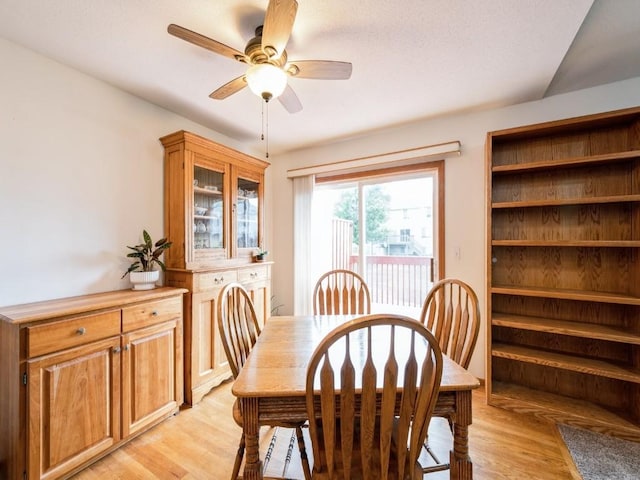 2635 6th St, Marion, IA 52302 - dining area with light wood-type flooring and a ceiling fan