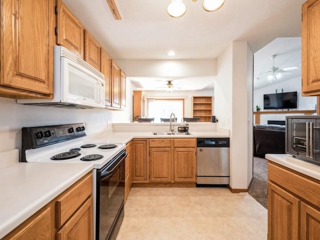 2635 6th St, Marion, IA 52302 - kitchen featuring electric range oven, dishwasher, white microwave, a ceiling fan, and light countertops