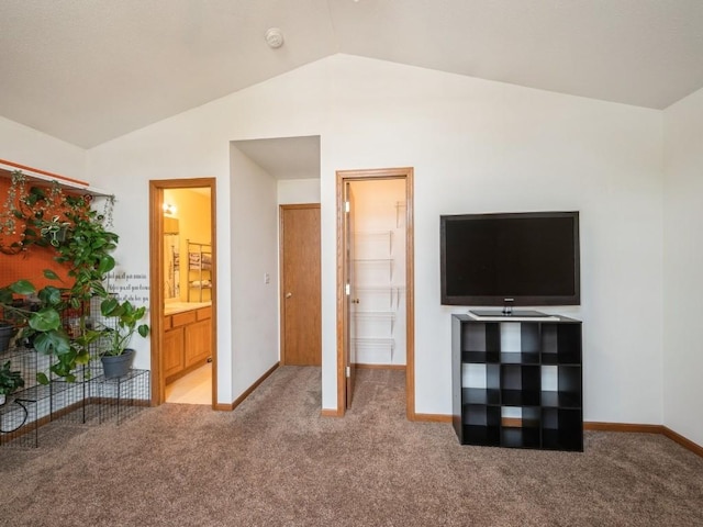 2635 6th St, Marion, IA 52302 - unfurnished bedroom featuring carpet flooring and lofted ceiling