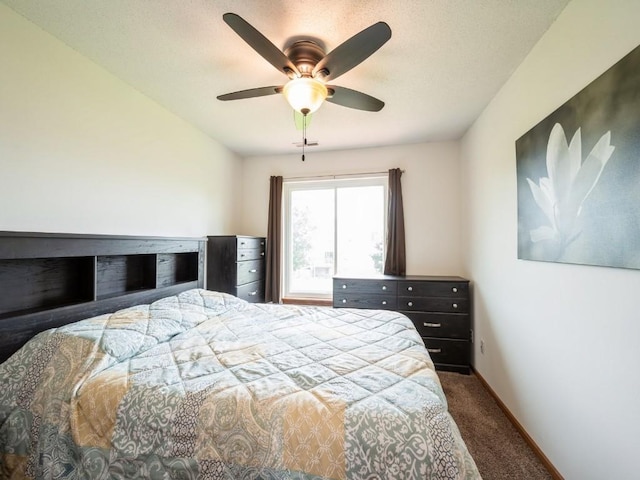 2635 6th St, Marion, IA 52302 - bedroom with dark colored carpet and a ceiling fan
