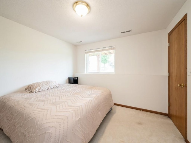 2635 6th St, Marion, IA 52302 - bedroom featuring light colored carpet and baseboards