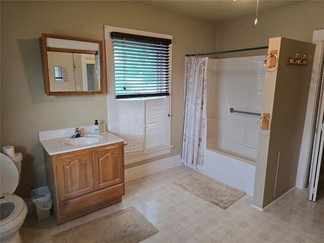 708 E 4th St, Vinton, IA 52349 - bathroom with vanity, shower / bath combination with curtain, and tile patterned floors