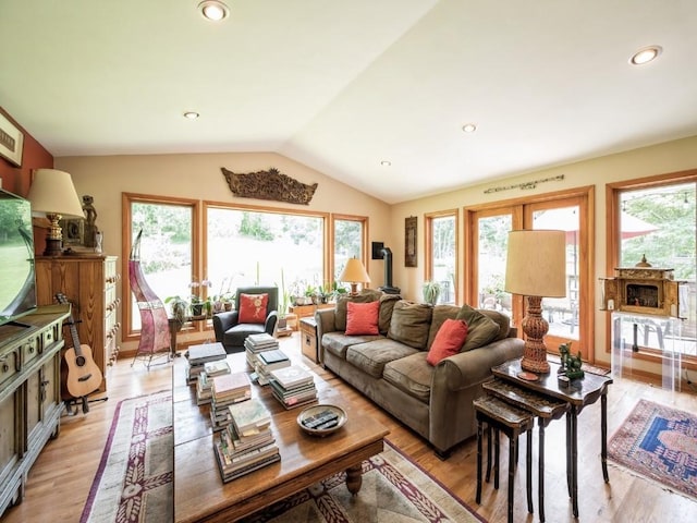 4288 Fox Meadow Dr SE, Cedar Rapids, IA 52403 - living room with lofted ceiling, light wood-type flooring, and recessed lighting