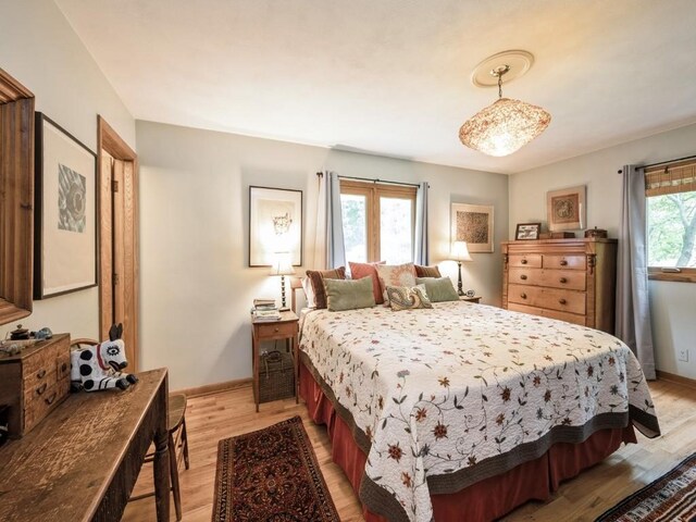 4288 Fox Meadow Dr SE, Cedar Rapids, IA 52403 - bedroom with light wood-style floors and baseboards