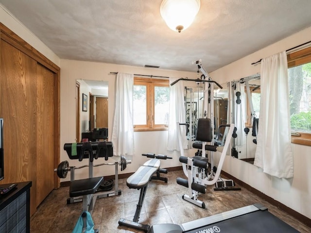 4288 Fox Meadow Dr SE, Cedar Rapids, IA 52403 - workout area featuring baseboards