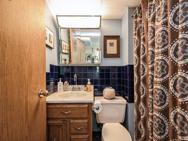 4288 Fox Meadow Dr SE, Cedar Rapids, IA 52403 - bathroom featuring vanity, a wainscoted wall, tile walls, and a shower with curtain