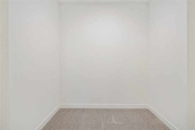 1417 Echo Ridge Ln, Marion, IA 52302 - empty room featuring light carpet and baseboards
