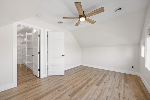 1153 Cedar Springs Dr, Marion, IA 52302 - bonus room featuring light wood-style flooring, lofted ceiling, and a ceiling fan
