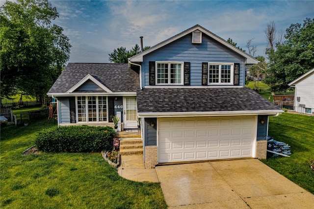 446 Bezdek Dr SW, Cedar Rapids, IA 52405 - tri-level home with a front yard, a shingled roof, an attached garage, and brick siding