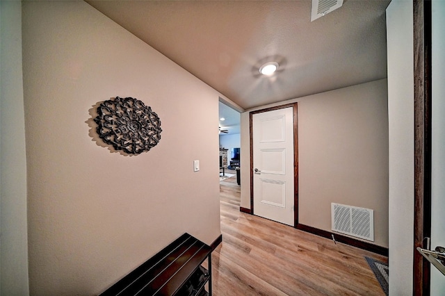 1004 Creekside Dr, Tiffin, IA 52340 - corridor featuring light wood-style floors and baseboards