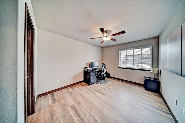 1004 Creekside Dr, Tiffin, IA 52340 - unfurnished office featuring a ceiling fan and wood finished floors