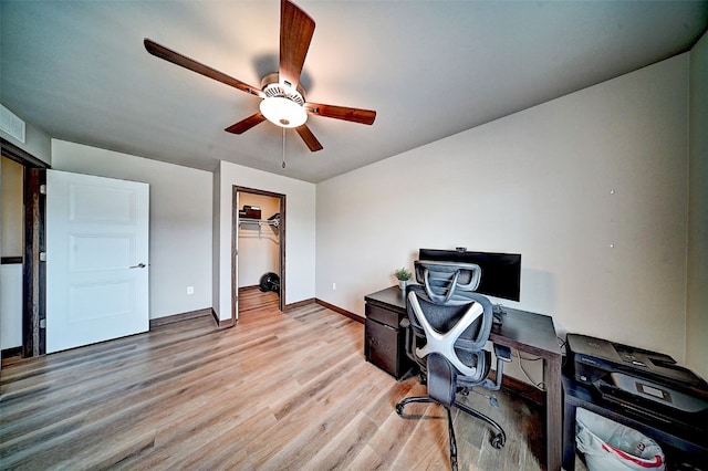 1004 Creekside Dr, Tiffin, IA 52340 - office area featuring light wood-type flooring and a ceiling fan