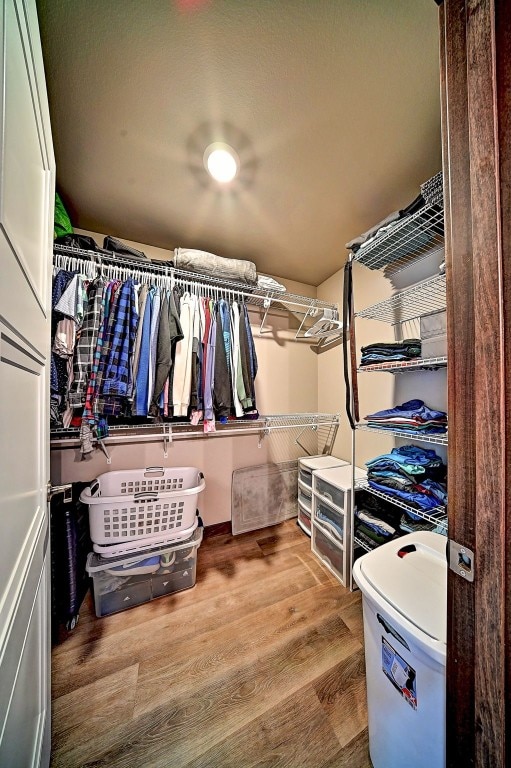 1004 Creekside Dr, Tiffin, IA 52340 - spacious closet with wood finished floors