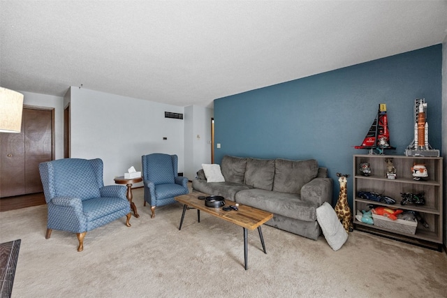 4485 Armar Dr SE Unit 101, Cedar Rapids, IA 52403 - living area featuring carpet and a textured ceiling