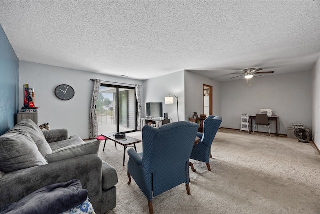 4485 Armar Dr SE Unit 101, Cedar Rapids, IA 52403 - living area featuring carpet floors, ceiling fan, and a textured ceiling