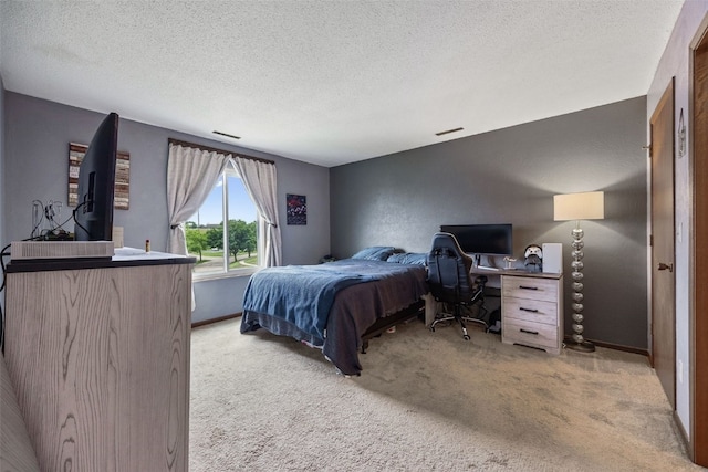 4485 Armar Dr SE Unit 101, Cedar Rapids, IA 52403 - bedroom featuring carpet and a textured ceiling