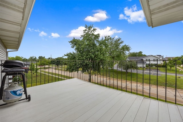 4485 Armar Dr SE Unit 101, Cedar Rapids, IA 52403 - deck featuring a grill and a lawn