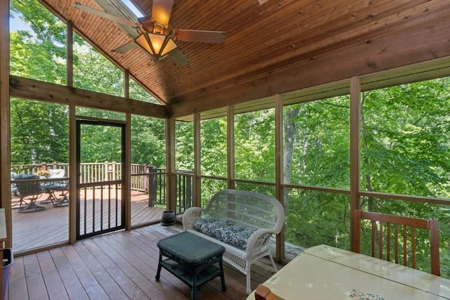 2520 NE Sugar Bottom Rd, Solon, IA 52333 - sunroom featuring a ceiling fan, vaulted ceiling, plenty of natural light, and outdoor dining area