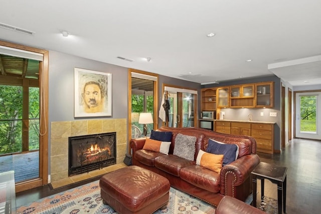 2520 NE Sugar Bottom Rd, Solon, IA 52333 - living area with wood finished floors, a fireplace, and recessed lighting