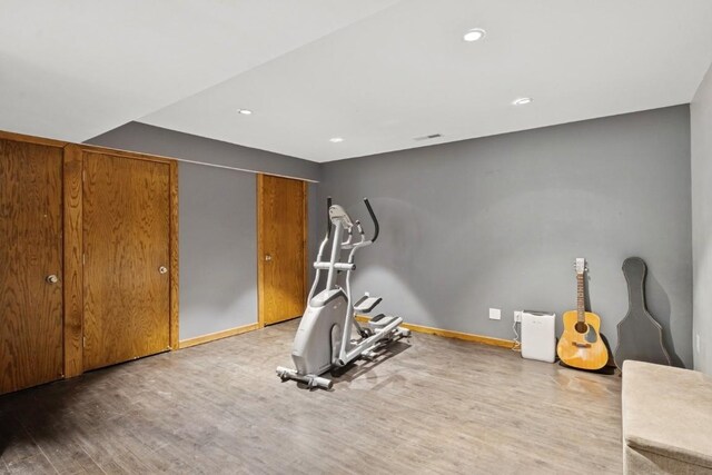 2520 NE Sugar Bottom Rd, Solon, IA 52333 - workout area featuring wood finished floors and recessed lighting