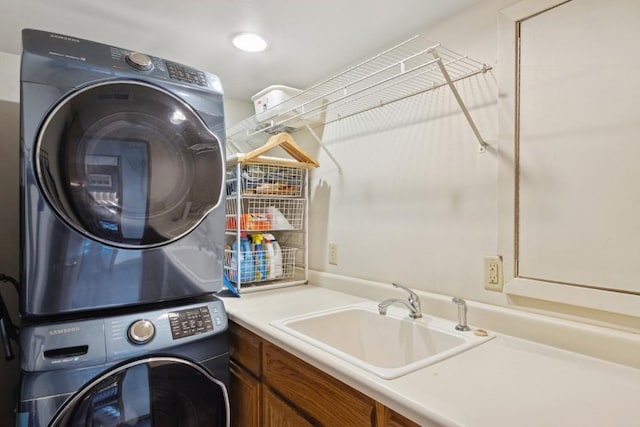2520 NE Sugar Bottom Rd, Solon, IA 52333 - washroom with stacked washer / drying machine and cabinet space