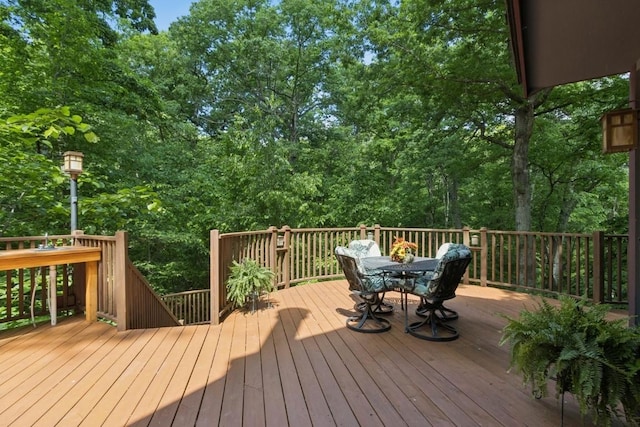 2520 NE Sugar Bottom Rd, Solon, IA 52333 - wooden terrace with outdoor dining space
