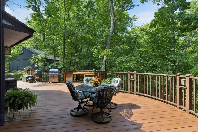 2520 NE Sugar Bottom Rd, Solon, IA 52333 - wooden terrace with outdoor dining space