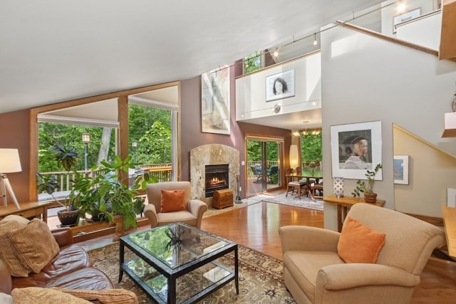 2520 NE Sugar Bottom Rd, Solon, IA 52333 - living room with wood finished floors, healthy amount of natural light, and a premium fireplace