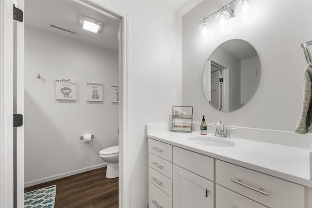 1574 Turkey Ridge Ct NW, Swisher, IA 52338 - bathroom featuring vanity and wood finished floors