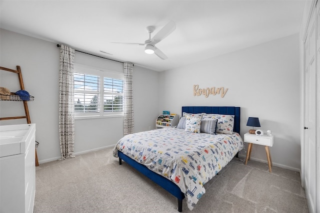 1574 Turkey Ridge Ct NW, Swisher, IA 52338 - carpeted bedroom featuring baseboards and ceiling fan