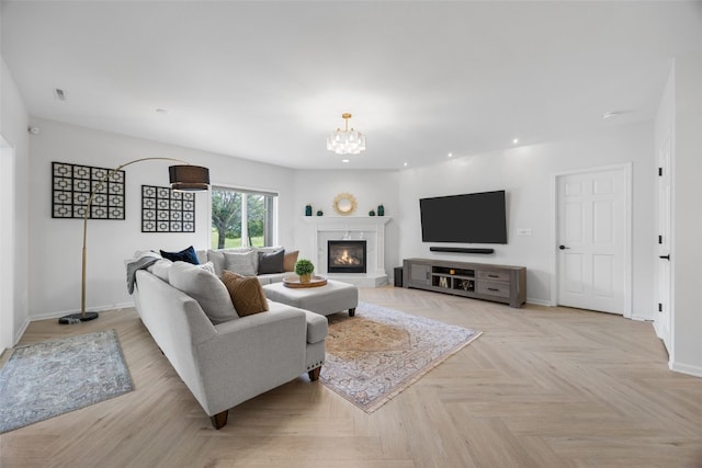 1574 Turkey Ridge Ct NW, Swisher, IA 52338 - living area featuring recessed lighting, a chandelier, and a fireplace