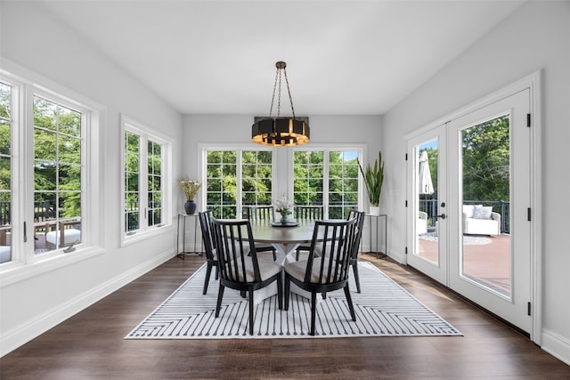1574 Turkey Ridge Ct NW, Swisher, IA 52338 - sunroom with french doors and a chandelier