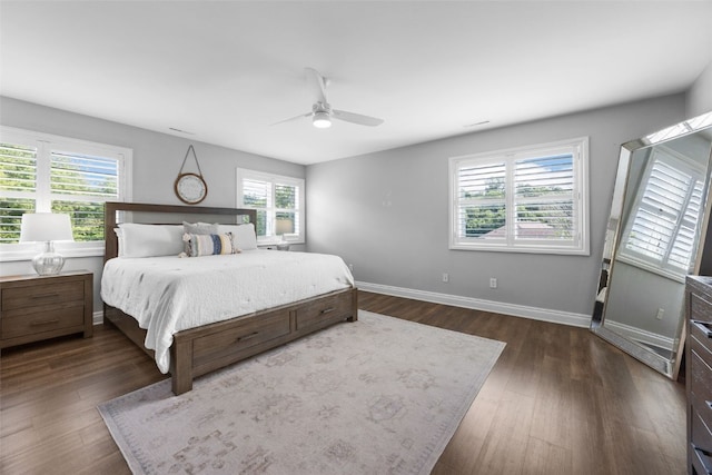 1574 Turkey Ridge Ct NW, Swisher, IA 52338 - bedroom with dark wood-style flooring and a ceiling fan