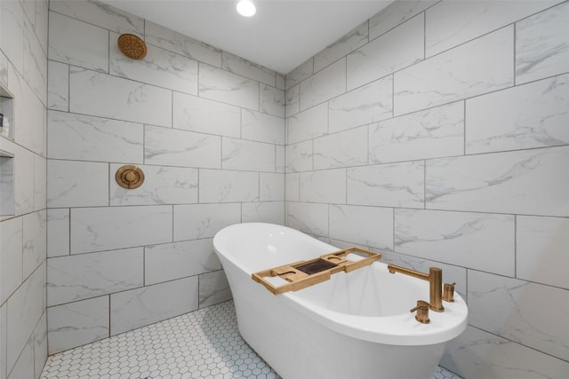 1574 Turkey Ridge Ct NW, Swisher, IA 52338 - full bathroom featuring tile walls, a soaking tub, and a tile shower