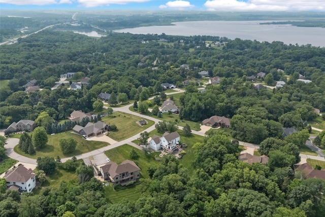 1574 Turkey Ridge Ct NW, Swisher, IA 52338 - aerial view of residential area with a nearby body of water and a forest