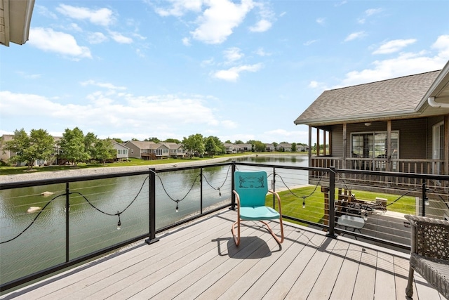 4131 Lakeview Dr SW, Cedar Rapids, IA 52404 - wooden deck featuring a water view and a residential view