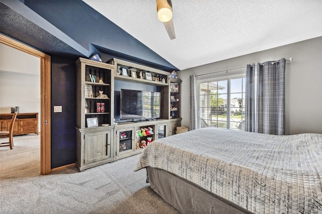 4131 Lakeview Dr SW, Cedar Rapids, IA 52404 - bedroom with vaulted ceiling, carpet flooring, a textured ceiling, and a ceiling fan