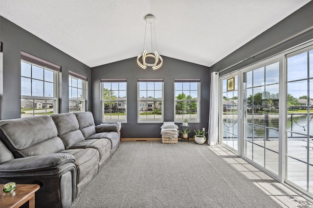4131 Lakeview Dr SW, Cedar Rapids, IA 52404 - sunroom / solarium featuring lofted ceiling and a water view