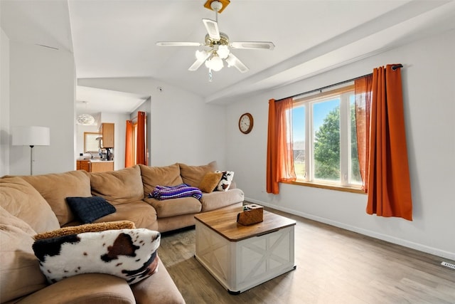 1255 Pacific St, Ely, IA 52227 - living area with light wood-style floors, ceiling fan, and vaulted ceiling