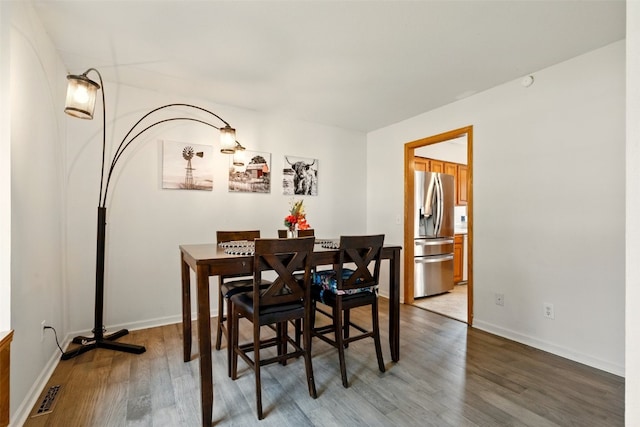 1255 Pacific St, Ely, IA 52227 - dining room with wood finished floors and baseboards