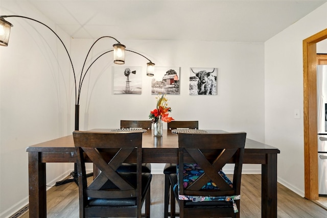 1255 Pacific St, Ely, IA 52227 - dining space with wood finished floors